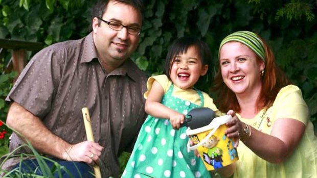 David and Debbie Iacopino with their four-year-old daughter Yueli, whom they adopted from China. "She is the best thing that ever happened to both of us," Debbie says.