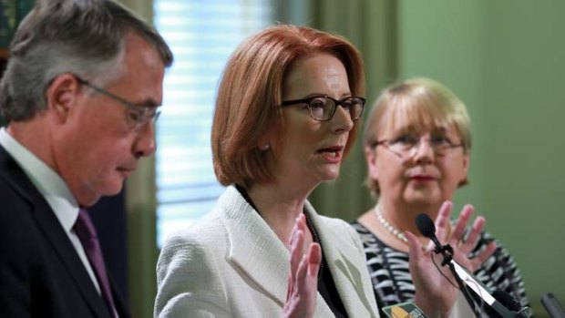 Prime Minister Julia Gillard, Treasurer  Wayne Swan and Disabilities Reform Minister Jenny Macklin announce a Medicare levy raise to fund an NDIS