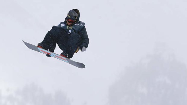 A December 22, 2013, filephoto shows Norway's Torstein Horgmo flying off a jump during the US Grand Prix slopestyle snowboarding finals in Colorado. Horgmo was taken to a hospital after crashing in Sochi on Monday.