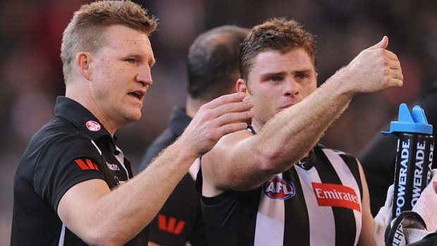 Those were the days ... Heath Shaw with his now former coach Nathan Buckley.