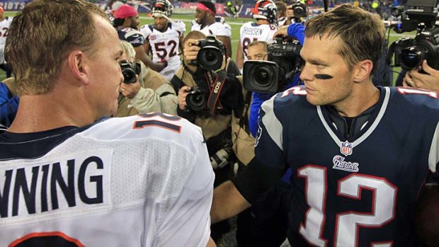 Title match: Quarterbacks Peyton Manning and Tom Brady square off.