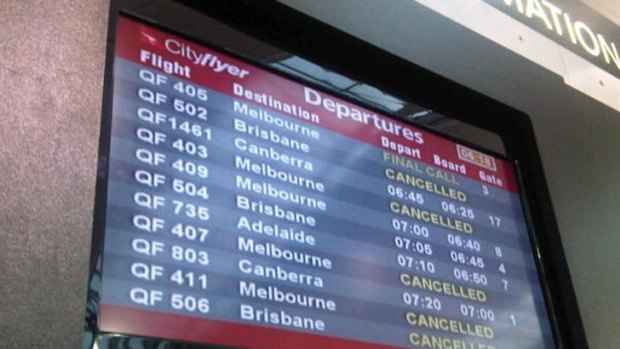 Travel chaos ... flights cancelled at Sydney Airport this morning.