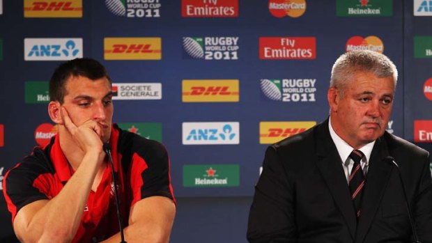 Tall order ... Wales coach Warren Gatland, right, has assigned the unenviable task of shutting down Australia's David Pocock to Sam Warburton, left.