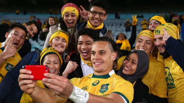 Happy snap: Matt Toomua poses with fans after winning the Rugby Championship.