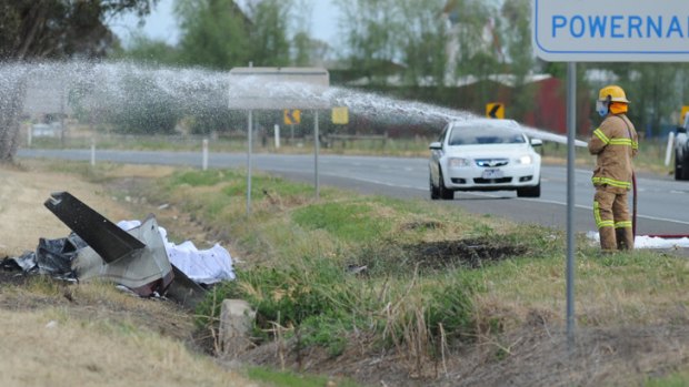 Shepparton emergency workers hose down the area.