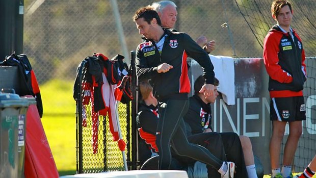 Out of the team: Stephen Milne leaves St Kilda training on Friday. He will miss Saturday's match against Melbourne.