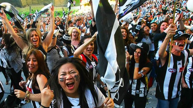 Will they buy it? ... Collingwood fans in full voice.