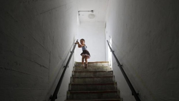 A girl leaves a bomb shelter after a siren warning of incoming rockets was sounded in the southern Israeli city of Ashkelon on Wednesday.