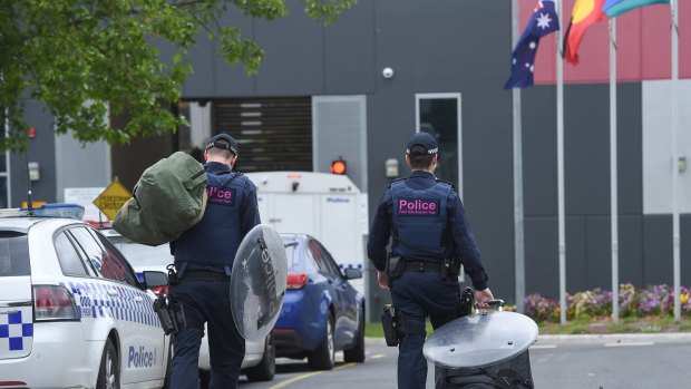 Police at the Parkville youth detention centre on Monday. 
