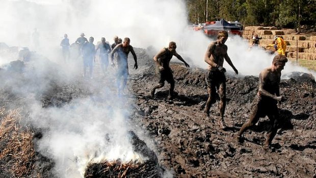 Mud and guts: Competitors in the Tough Mudder event at Glenworth Valley on the NSW Central Coast in September this year.