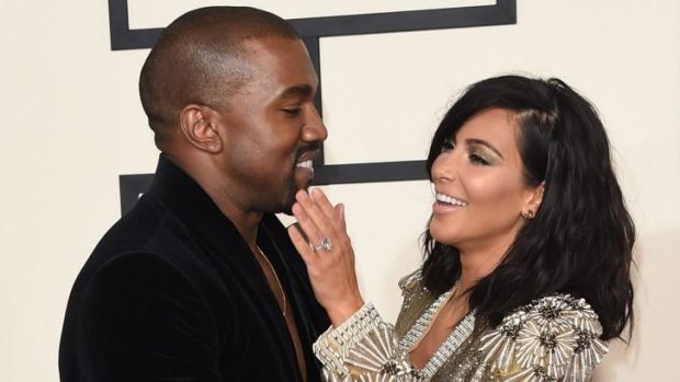 Just 'awesome' ... Kanye West with wife Kim Kardashian at this year's Grammy Awards.