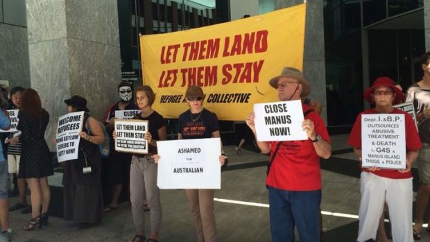 Protesters outside the Department of Immigration's Brisbane office call for the closure of the Manus Island detention centre.