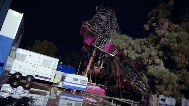 Destroyed rides at the funfair in Gandia, near Valencia.