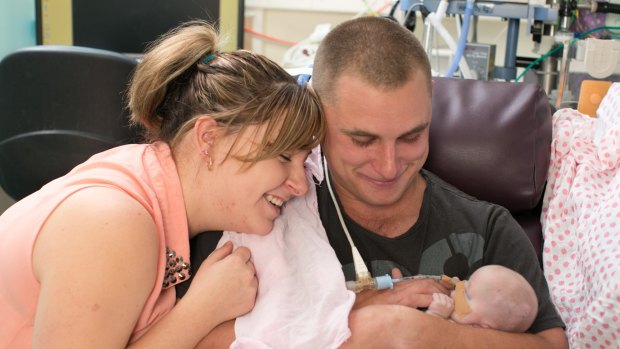 Jade and Josh Pope with their baby, Mia, who died of heart problems at just six weeks old.