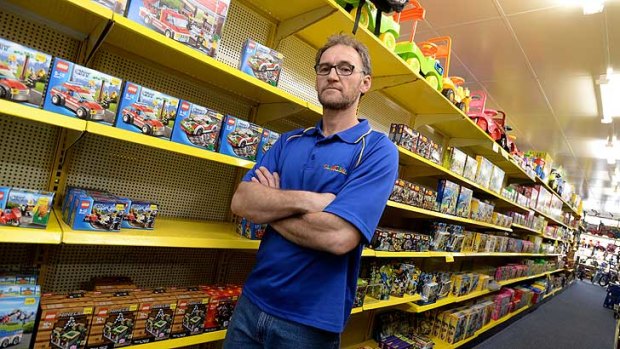 Shelves stripped bare ... Owner of Toyworld Seymour Werner Baumann, where a total of $15,000 of Lego was stolen.