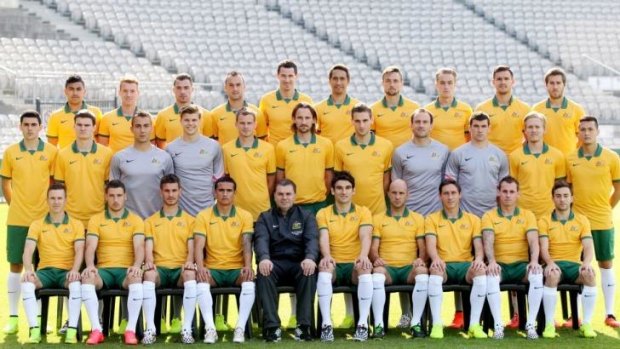 The Socceroos pose for a team photo on Friday.