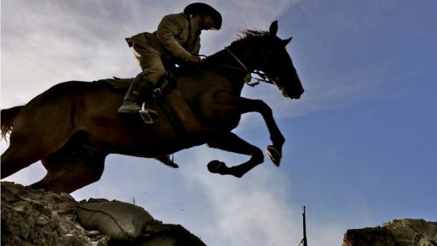 Midnight jumps an Ottoman trench in a scene from <i>The Waler: Australia's Great War Horse</i>.