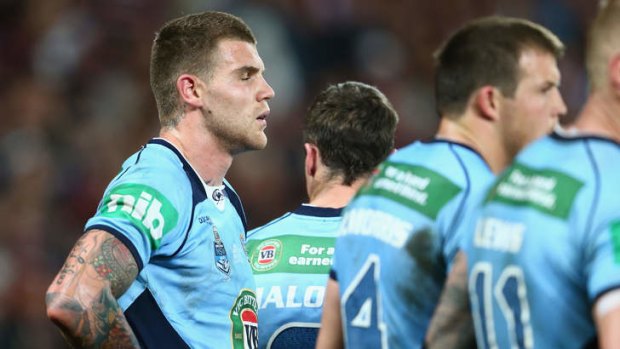 BRISBANE, AUSTRALIA - JUNE 26:  Josh Dugan of the Blues looks dejected after a Marrons try during game two of the ARL State of Origin series between the Queensland Maroons and the New South Wales Blues at Suncorp Stadium on June 26, 2013 in Brisbane, Australia.  (Photo by Mark Kolbe/Getty Images)