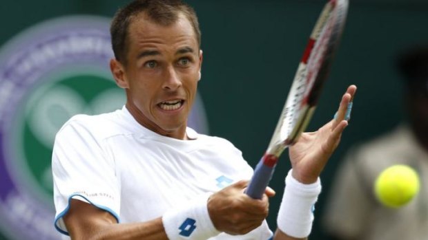 Hesitated: the open court meant Lukas Rosol could not go on the all-out attack.