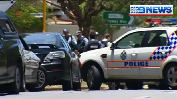 Police have descended on a Banyo street, where a gunman is believed to be holding people hostage.