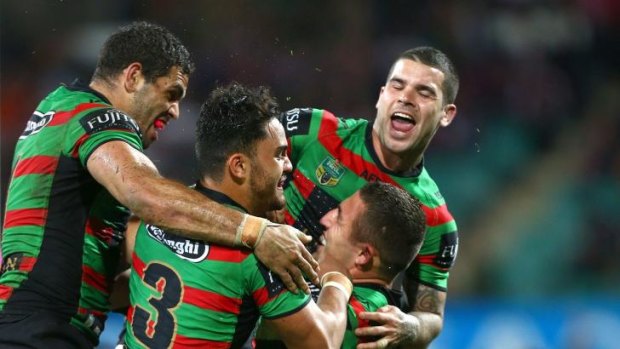 Good times: the Rabbitohs celebrate a Sam Burgess try.