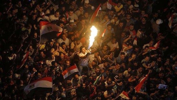 Egyptians celebrate the victory of Mohammed Morsi in the presidential elections in Tahrir Square on Saturday.
