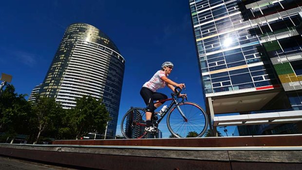 NAB employee Lana Casey rides to work and uses the office's lockers and bike facilities.