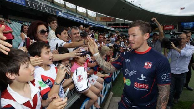 Todd Carney greets fans at the Sydney Football Stadium during Monday's Roosters Fan Day.