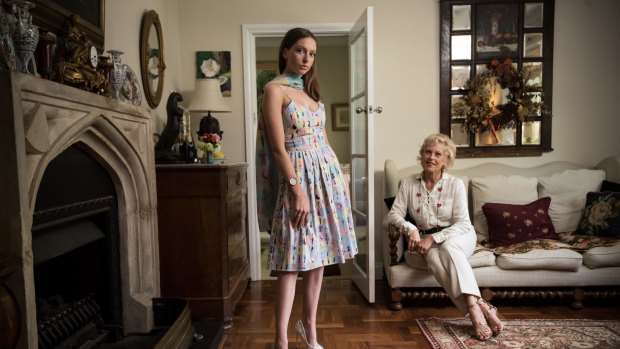 Charlotte Smith (right) with her daughter, Olivia, who wears a dress printed with illustrations of more than 120 vintage dresses that feature in Smith's new book, <i>One Enchanted Evening</I>. 