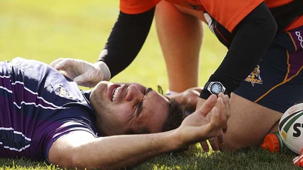 Maurice Blair lies on the ground after sustaining an injury against the Canberra Raiders on Sunday.