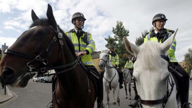 Numbers are up ... mounted police make their presence felt at the annual Notting Hill Carnival.