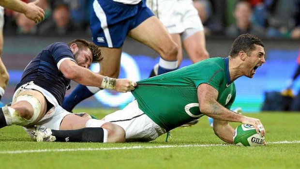 Try time: Rob Kearney of Ireland dives over for a try during the Six Nations match between Ireland and Scotland.