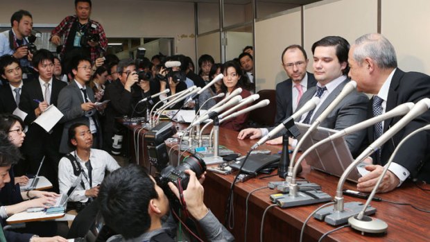 Mark Karpeles (second from right), president of MtGox bitcoin exchange, speaks during a press conference in Tokyo oin February.