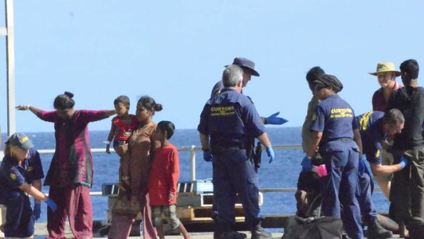 Refugees from Sri Lanka arrive for processing at Christmas island.