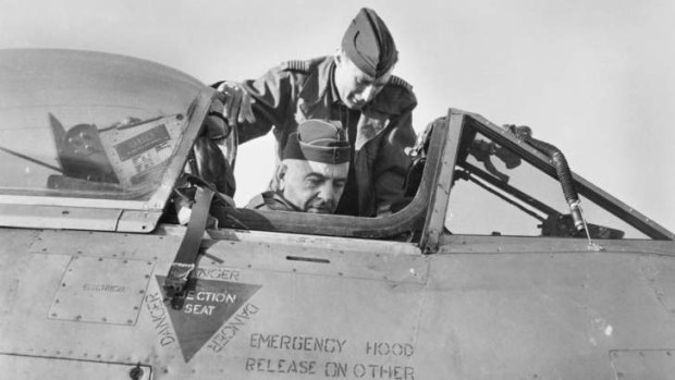 Kimpo, South Korea 1951, Air Vice-Marshall J.P.J McCauley, Air Officer Commanding Eastern Area, RAAF, in the cockpit of a meteor aircraft of No. 77 Squadron, with Wing Commander G. Steege, Commanding Officer No. 77 Squadron.