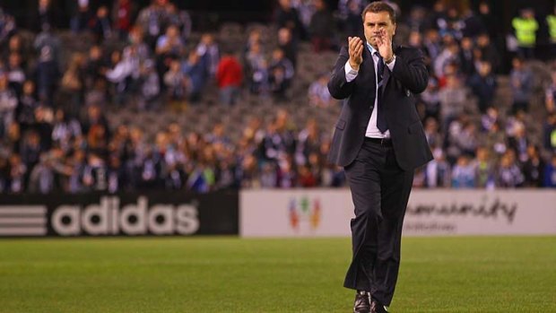 Hot property: Ange Postecoglou leaves the field after his final game with Victory.