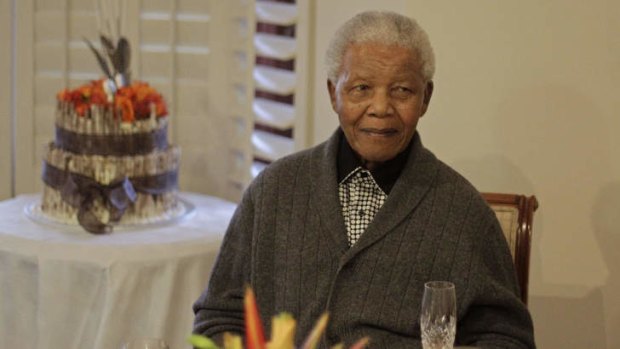 In hospital ... Nelson Mandela when he was celebrating his birthday earlier this year.