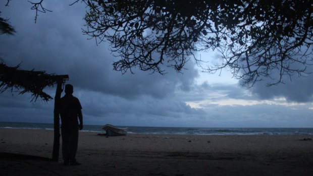 Megaraj Suresh, onthe beach in Batticaloa, says trying to come to  Australia was his worst mistake.