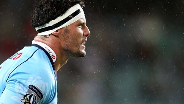 Al Baxter of the Waratahs scored his first try in Super rugby in his 100th game.