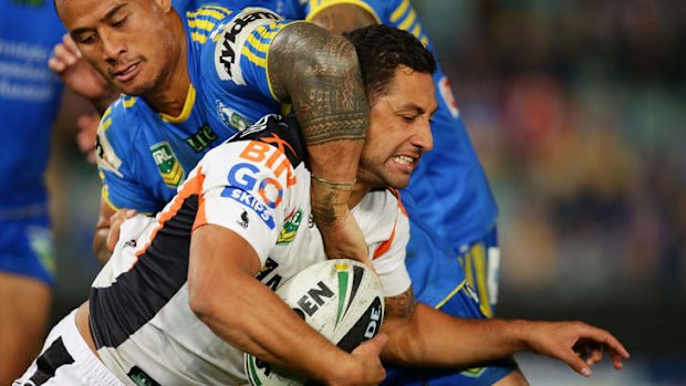 Blues boy: Benji Marshall is stopped by Ben Roberts.