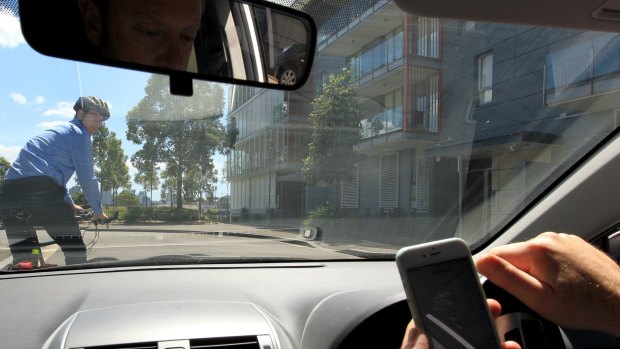 Driven to distraction: hands-free phones are just as distracting as hand-held ones for drivers