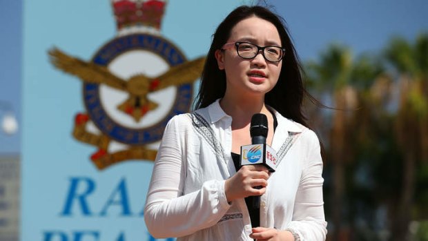 A China News Corporation reporter outside RAAF base Pearce in Perth.