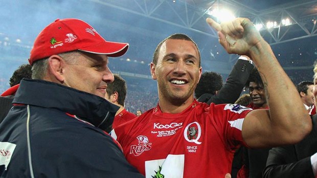 Reds boss Ewen McKenzie and his playmaker Quade Cooper.