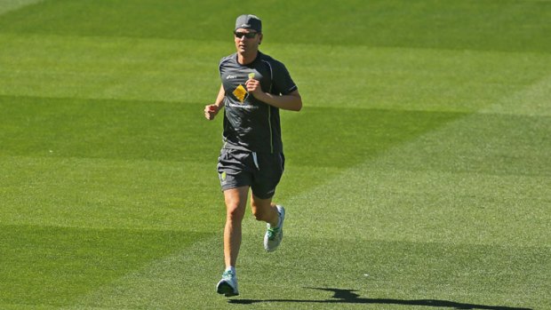 Australian captain Michael Clarke runs during an Australian nets session at Melbourne Cricket Ground.