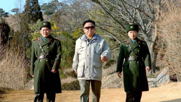 North Korean leader Kim Jong-il (C) inspects the command unit of Korean People's Army unit 109 at an undisclosed location in North Korea in this undated photo released by Korea News Service from 2006.