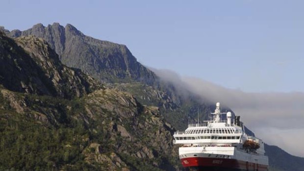 Chilled outing ... a Hurtigruten cruise ship cuts through frigid waters.