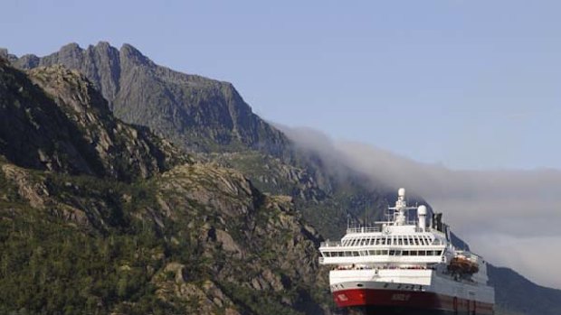 Chilled outing ... a Hurtigruten cruise ship cuts through frigid waters.