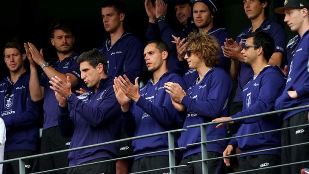 Dockers players acknowledge supporters during the Fremantle Dockers Fan Day.