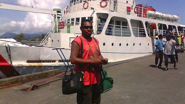 Philip Batari about to board a ferry (not the Rabaul Queen).