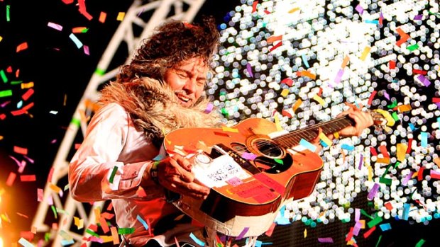Golden days: Wayne Coyne of The Flaming Lips plays at Harvest in 2011.